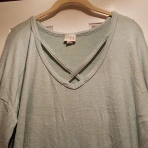A long sleeve green sweater size L